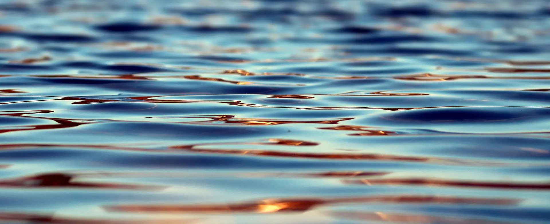 Still lake and soft morning light